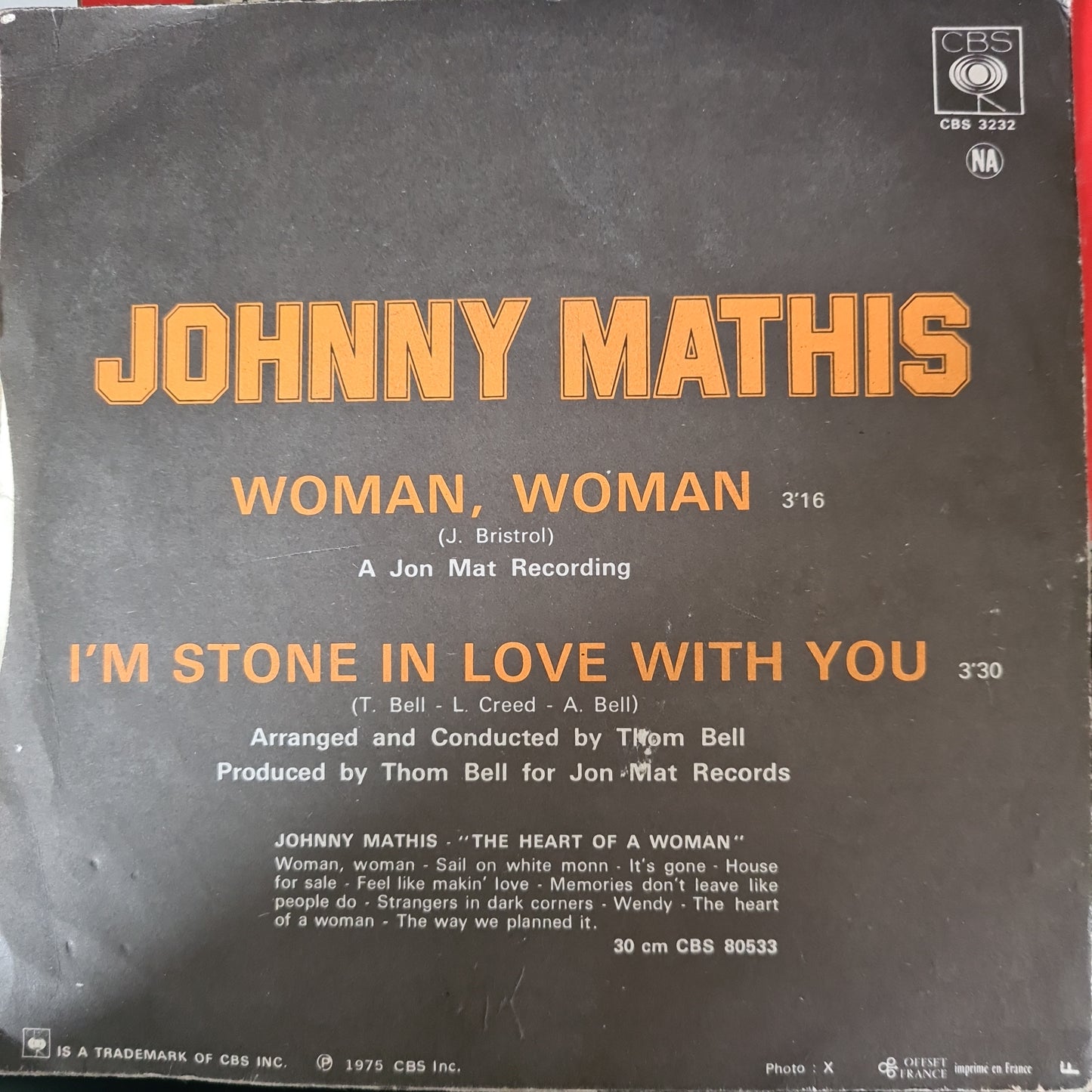 Johnny Mathis - Woman Woman Vinyl Singles Vinyl Very Good (VG) <br> Hoes Good Plus (G+)