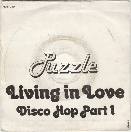 Puzzle - Living In Love Vinyl Singles Media VG+ \ Sleeve G+