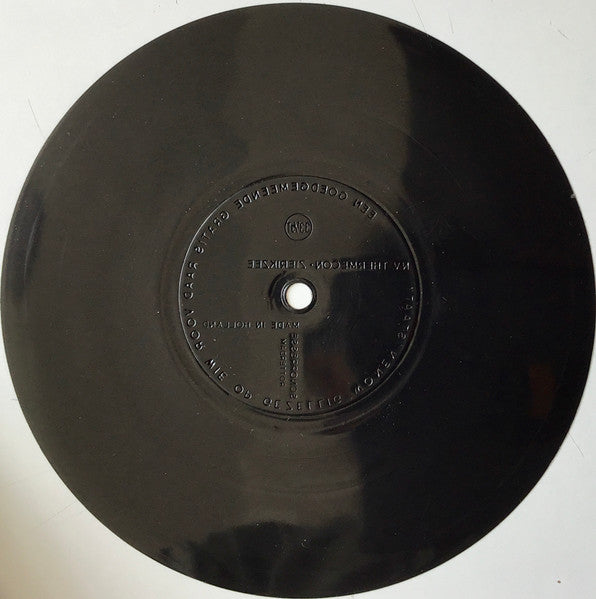Unknown Artist - Een Goedgemeende Gratis Raad Voor Wie Op Gezellig Wonen Staat (Flexi-disc) Flexi-disk Vinyl Very Good (VG) <br> Hoes Good Plus (G+)