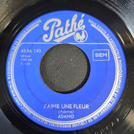Adamo - J'aime Une Fleur Vinyl Singles Media: VG <br> Sleeve: Generic "VINYLSINGLES.NL"