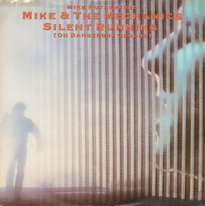 Mike & The Mechanics - Silent Running (On Dangerous Ground) Vinyl Singles Vinyl Very Good (VG) <br> Hoes Good Plus (G+)