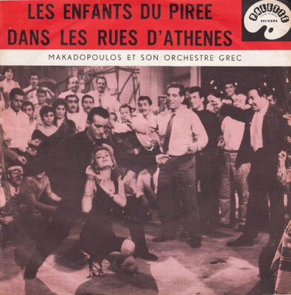 Makadopoulos And His Greek Serenaders - Les Enfants Du Piree Vinyl Singles Vinyl Very Good (VG) <br> Hoes Good Plus (G+)