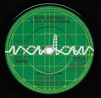 Elvis Costello & The Attractions - Oliver's Army Vinyl Singles Vinyl Zeer Goed / Hoesje Goed "VINYLSINGLES.NL"