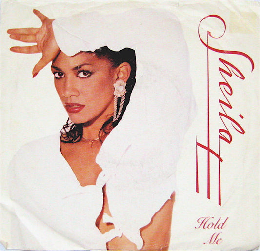 Sheila E. - Hold Me Vinyl Singles Vinyl Very Good (VG) <br> Hoes Good Plus (G+)